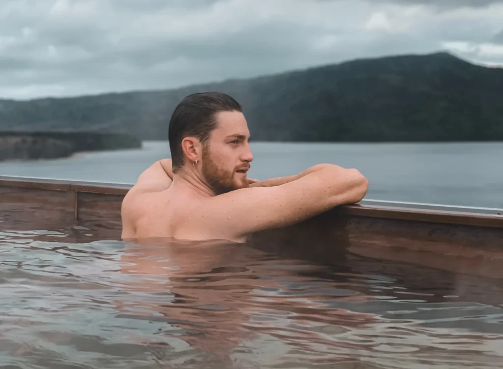 man enjoying a soak at sky lagoon 